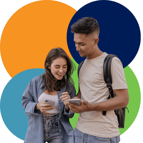 Caucasian woman and man standing and smiling looking at cell phones Caucasian woman and man standing and smiling looking at cell phones